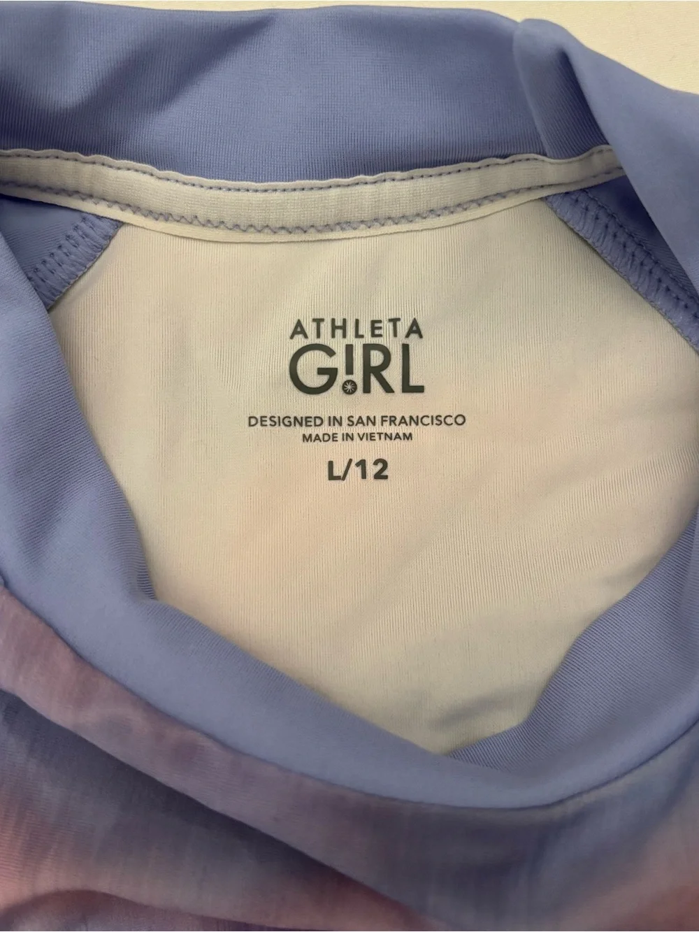 Athleta Kids Lavender and Pink Cloud Print Short Sleeve Rash Guard